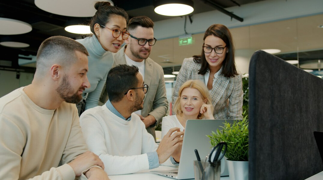 corporate team coding together