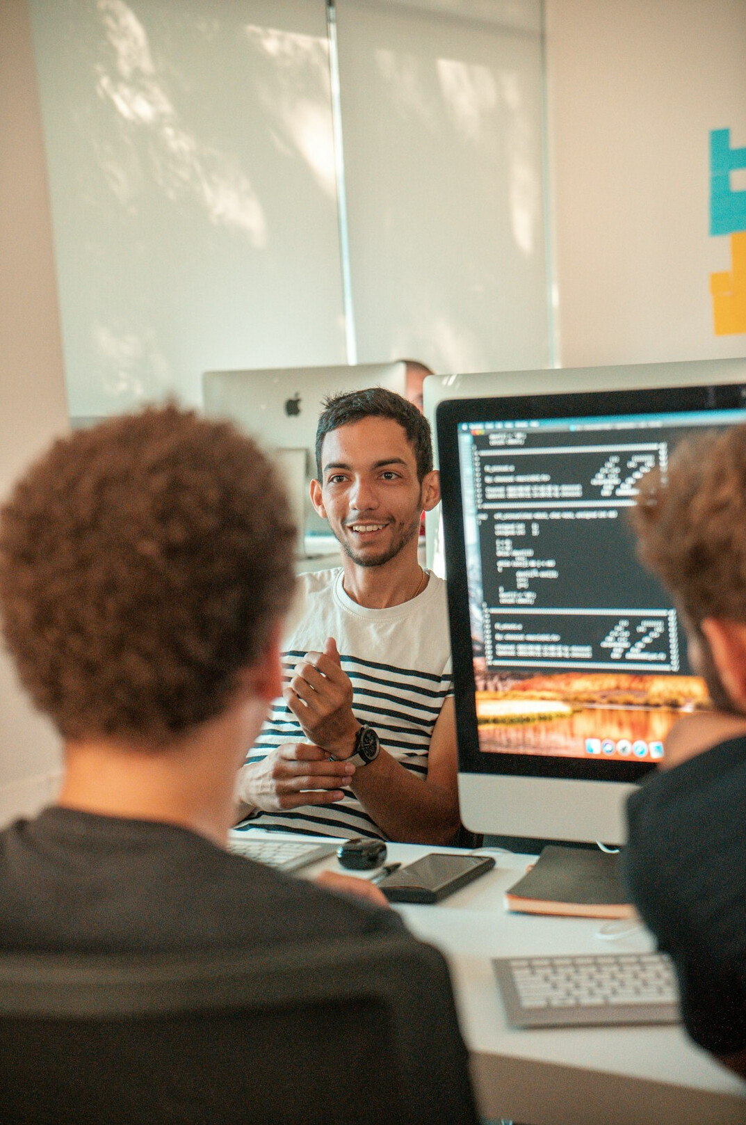 cybersecurity team reviewing code