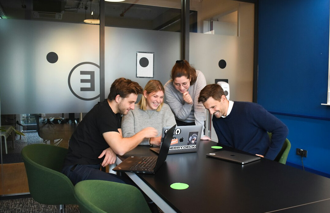 corporate team coding together
